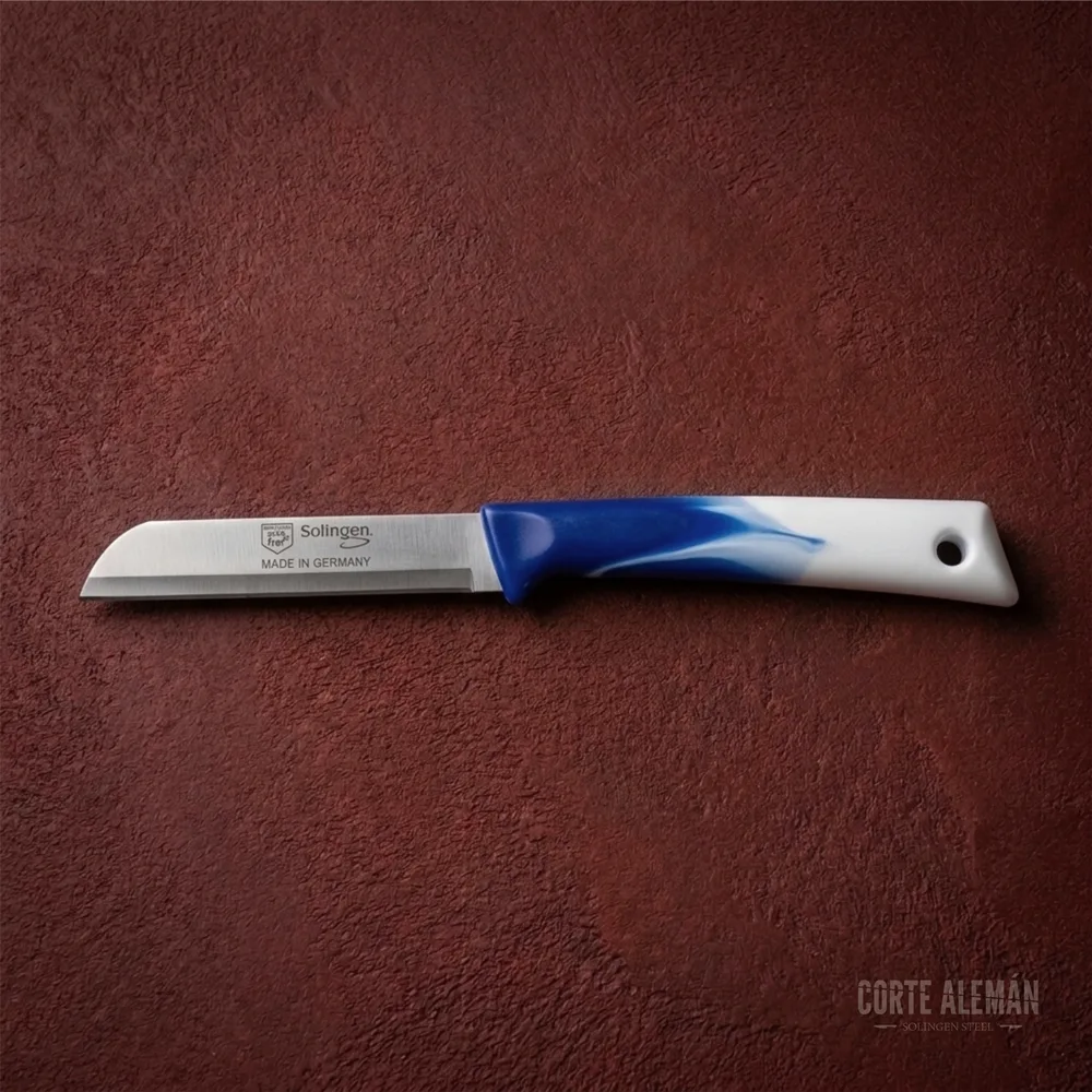 cuchillo para cortar tomates, en fondo rojo, marca max melchior