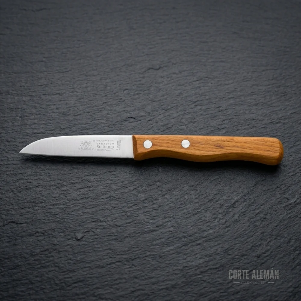 Cuchillo multiusos de Max Melichor con fondo naturla oscuro